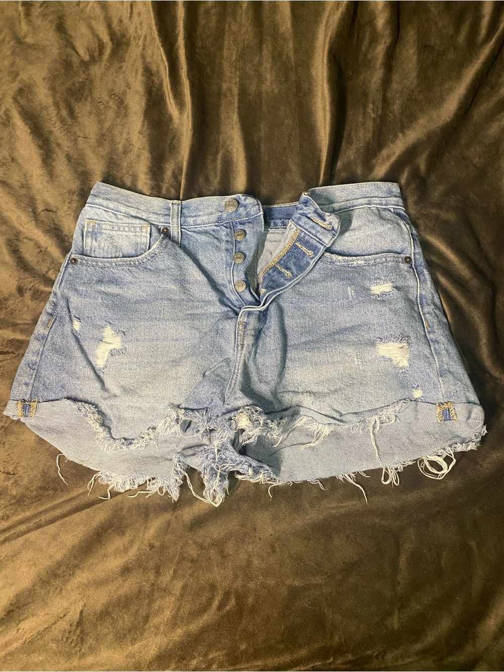 High-Rise Light Blue Distressed Denim Shorts